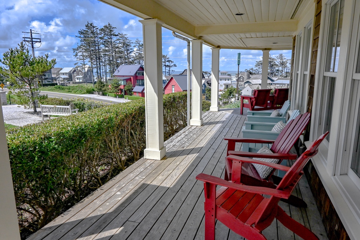 The wrap-around front porch offers the perfect spot to unwind and take in the views