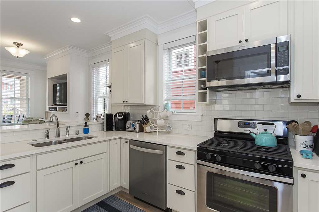 Kitchen with gas stove and stainless steel applicances