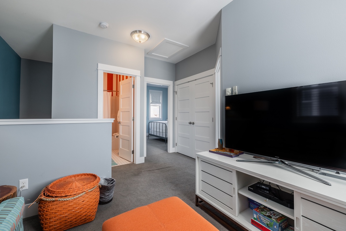 Upstairs media room with TV