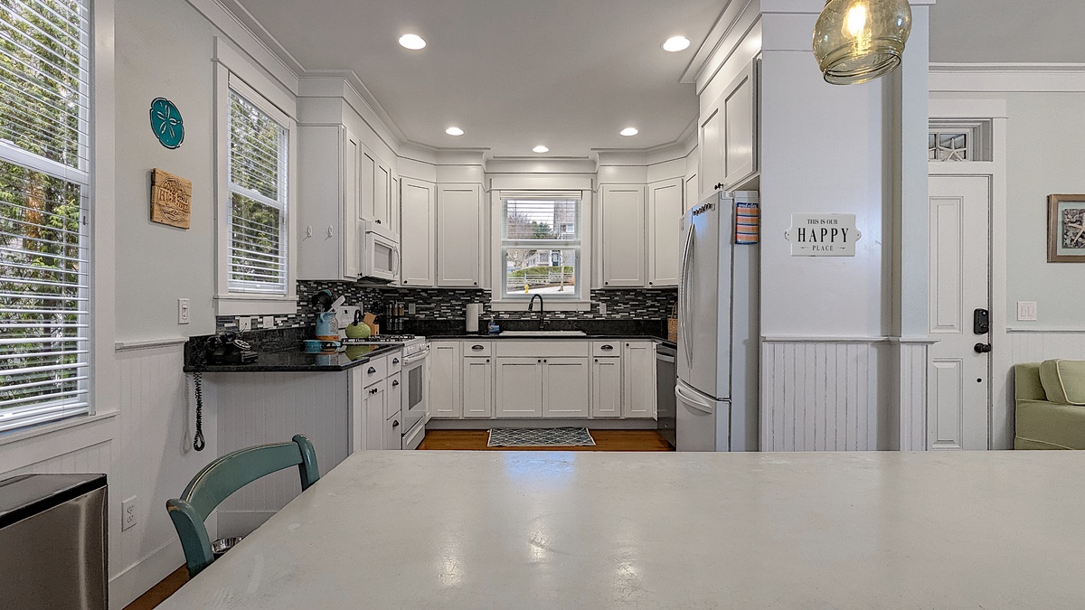 The kitchen is equipped with a gas range