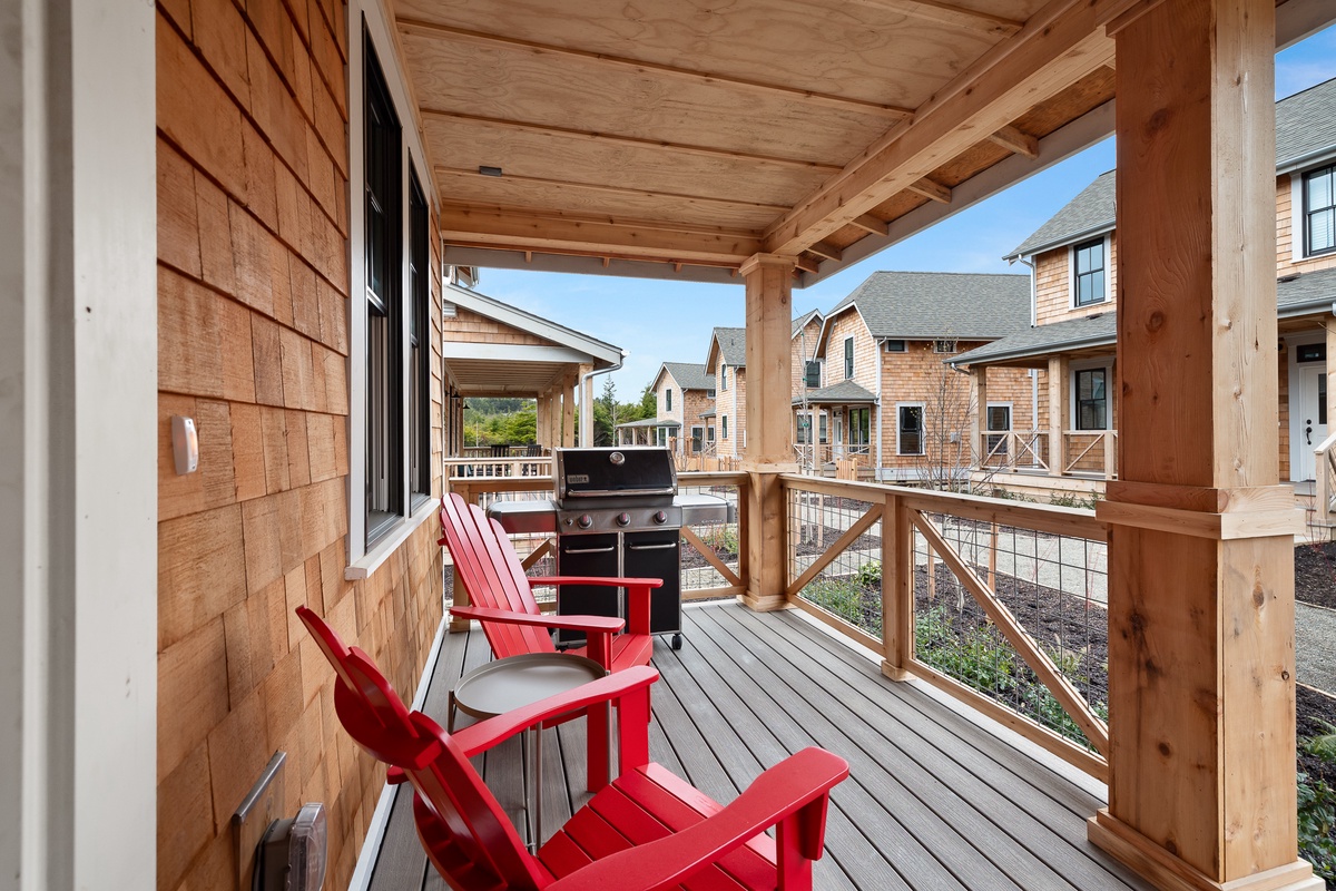 The covered front porch faces Cedar Run Park