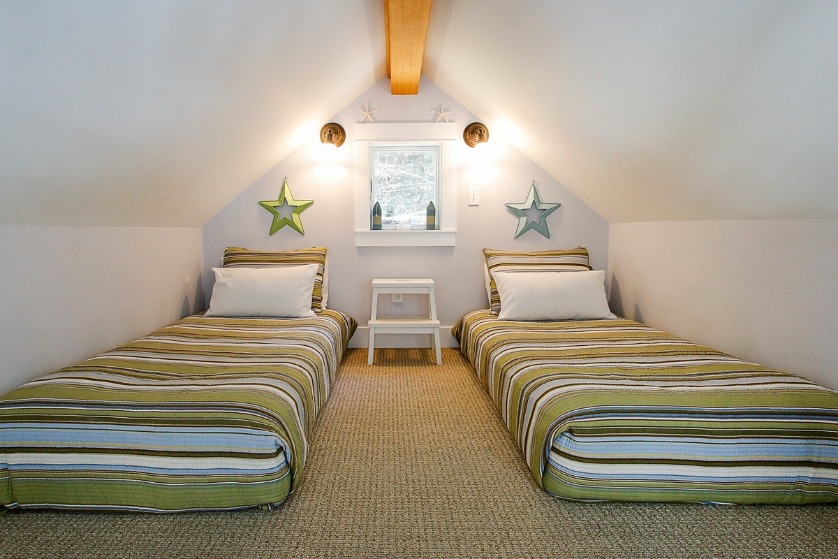 Twin beds in the ladder loft