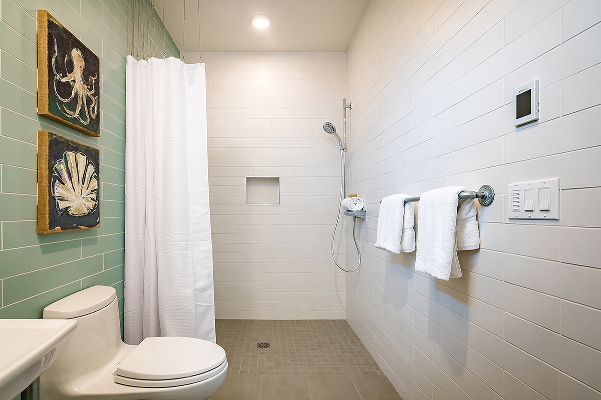 1st floor bathroom with roll in shower and heated floors