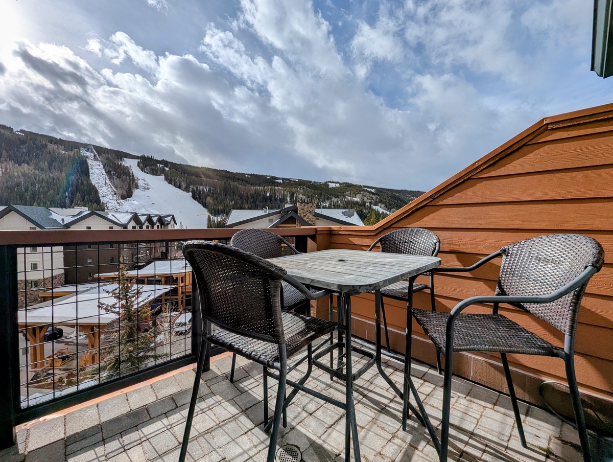 Step onto your private balcony and savor morning coffee with stunning ski slope views