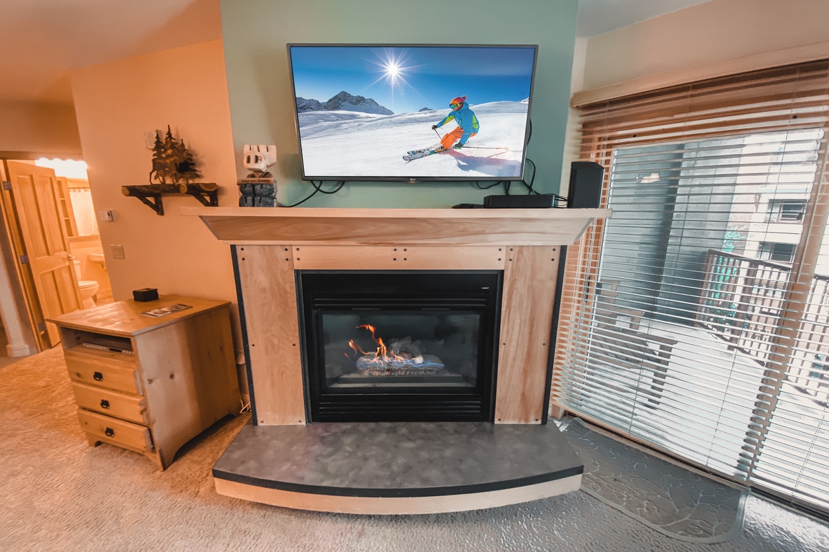 Relax by the gas fireplace and enjoy your favorite show