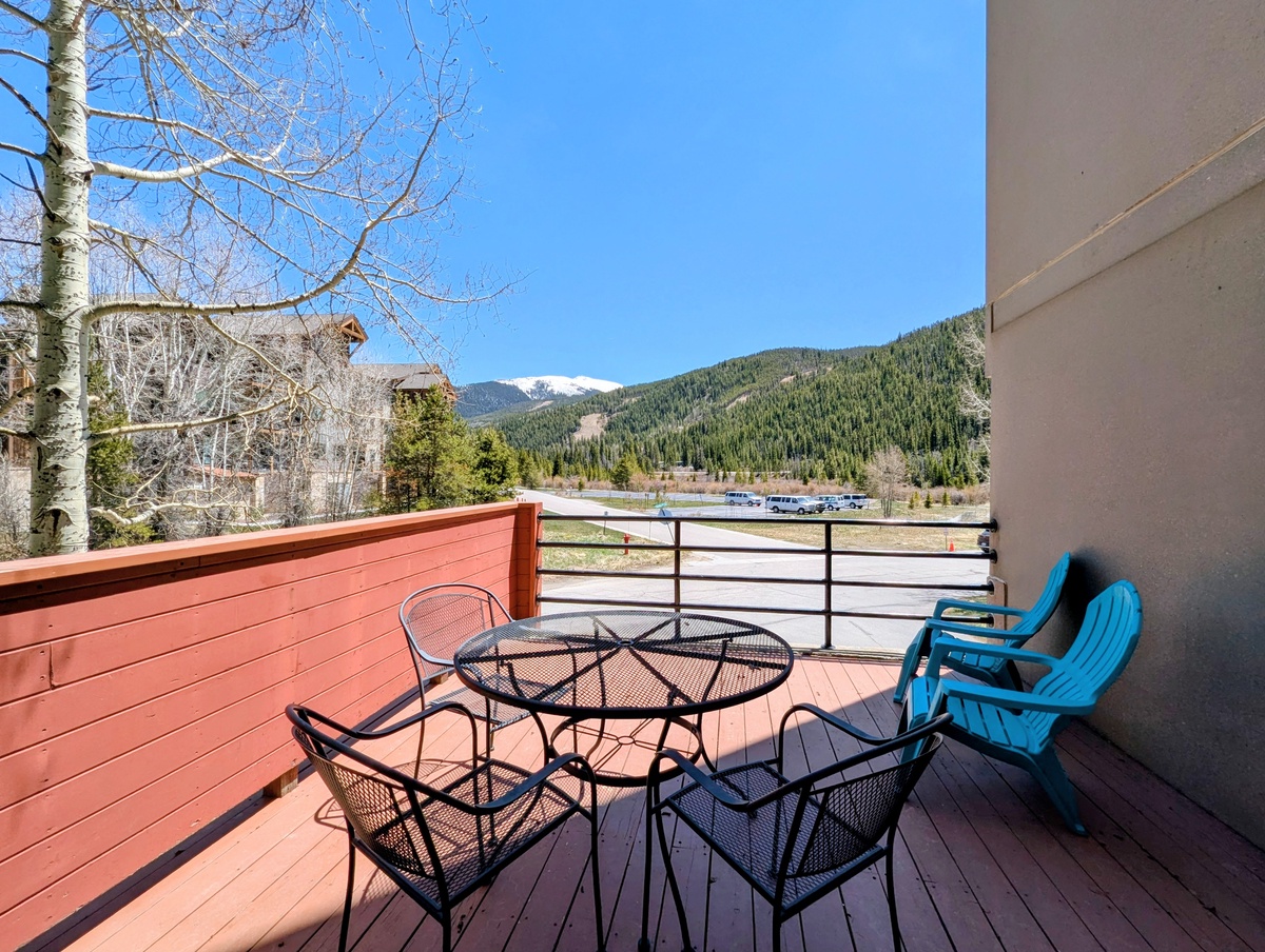 Enjoy your morning coffee at this private deck, featuring mountain views, fresh alpine air, and outdoor seating perfect for relaxing after a day of adventure.
