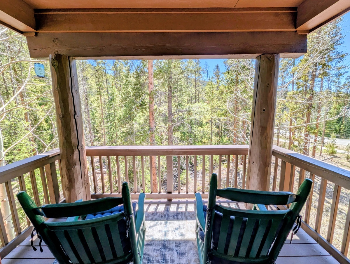 Relax on your private balcony with peaceful forest views—perfect for morning coffee or unwinding after a day of adventure.