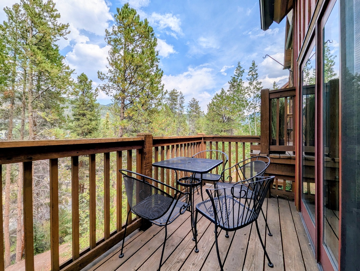 Step out onto your private balcony and breathe in the fresh mountain air. This peaceful perch invites you to sip morning coffee or share sunset conversations, all while soaking in the serene forest views that surround you.