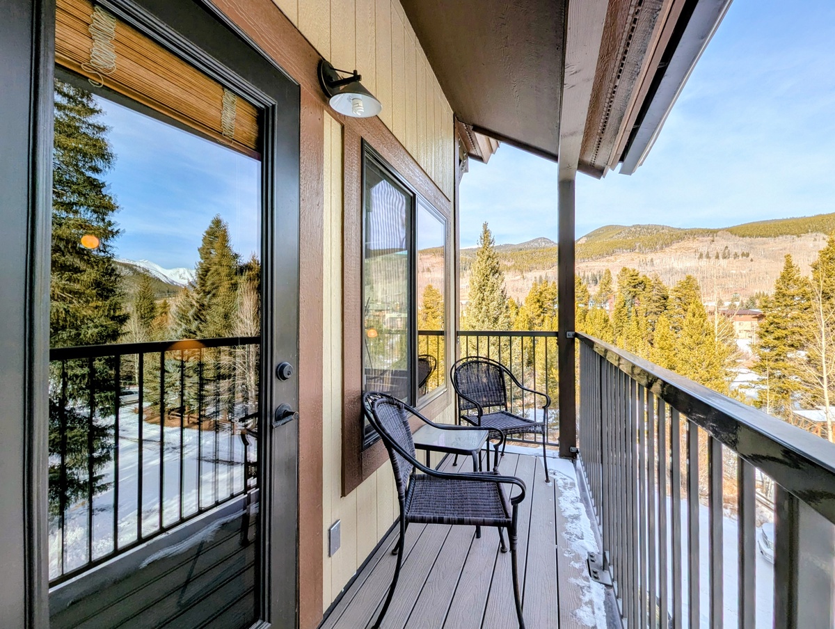 Step onto your private balcony for mountain views and fresh alpine air while enjoying morning coffee at the bistro table.