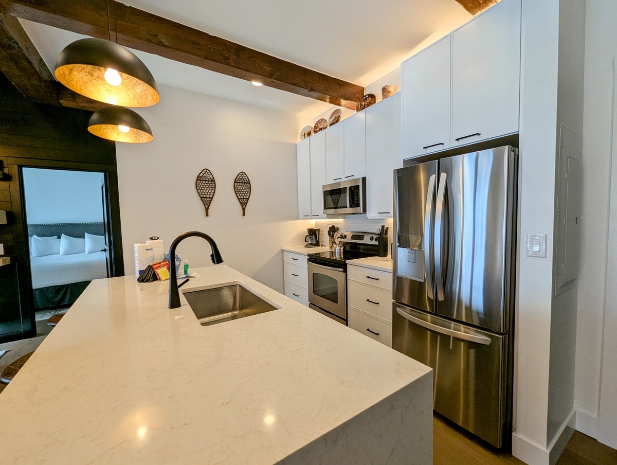 You'll love cooking in this sleek modern kitchen!