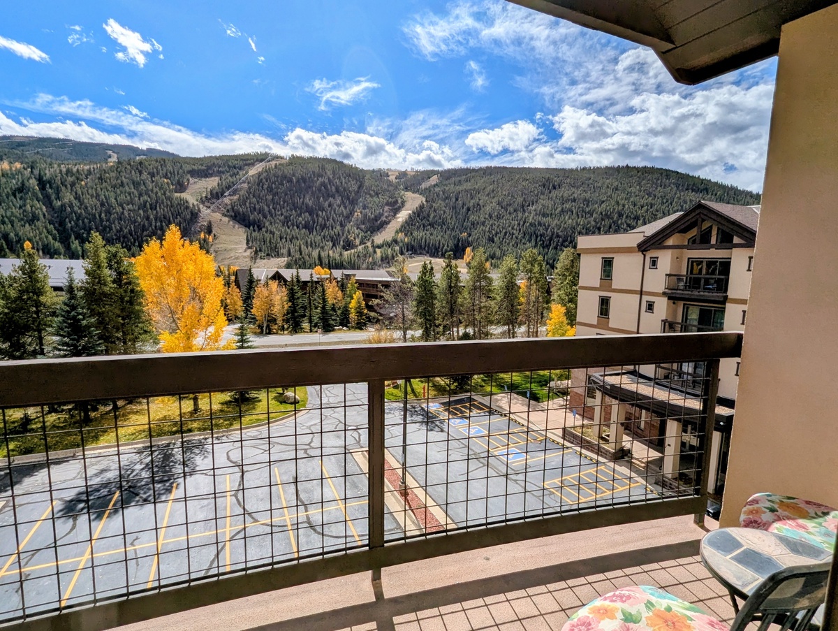 Breathtaking mountain scenery and autumn foliage frame your private balcony—perfect for morning coffee or evening relaxation amid nature's beauty.