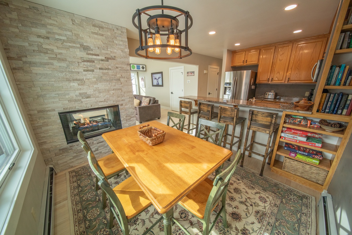 Beautiful dining area with fireplace ambiance