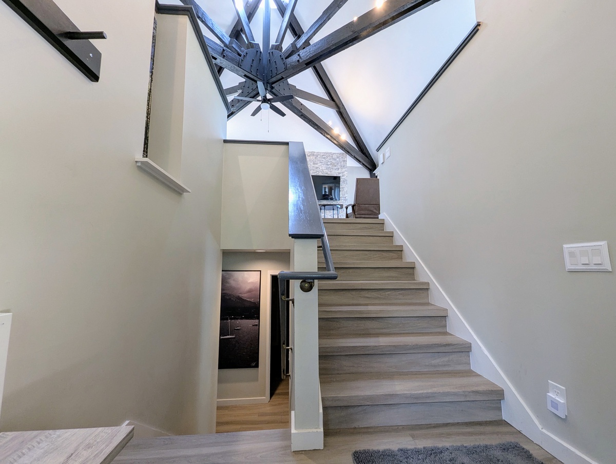 Entryway with stairs up to Main floor and stairs down to bedrooms