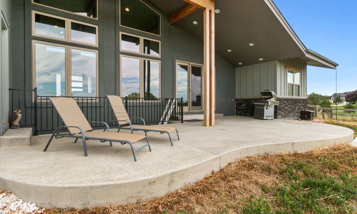 Back Patio | Partially Covered Deck, Lounge Chairs and BBQ Grill