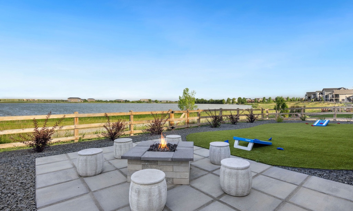 Backyard | Stunning outdoor fire pit with lake views!