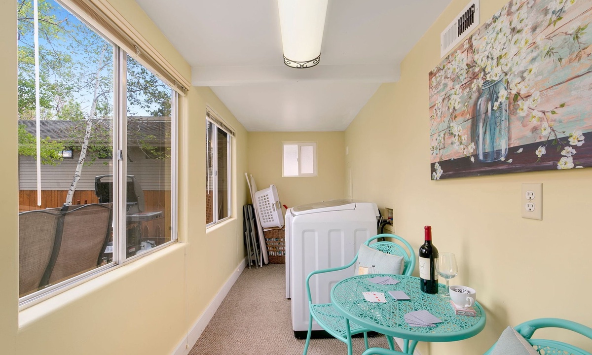 Laundry Room with Access to Backyard and Patio