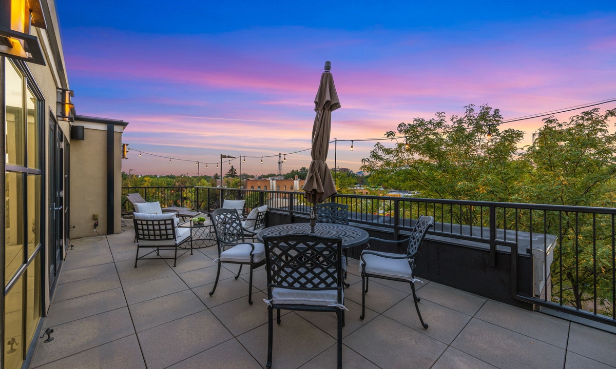 Rooftop Deck with Outdoor Dining Area and BBQ Grill