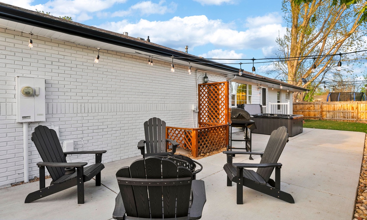 Backyard | Hot Tub, Grill and Lounge Area with Fire Pit