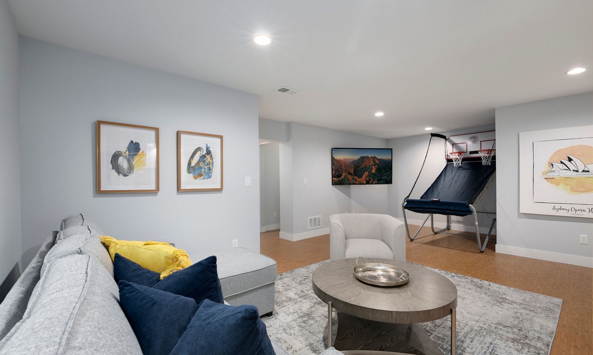 Media Room with Smart TV and Pop-A-Shot Arcade Game (basement level)