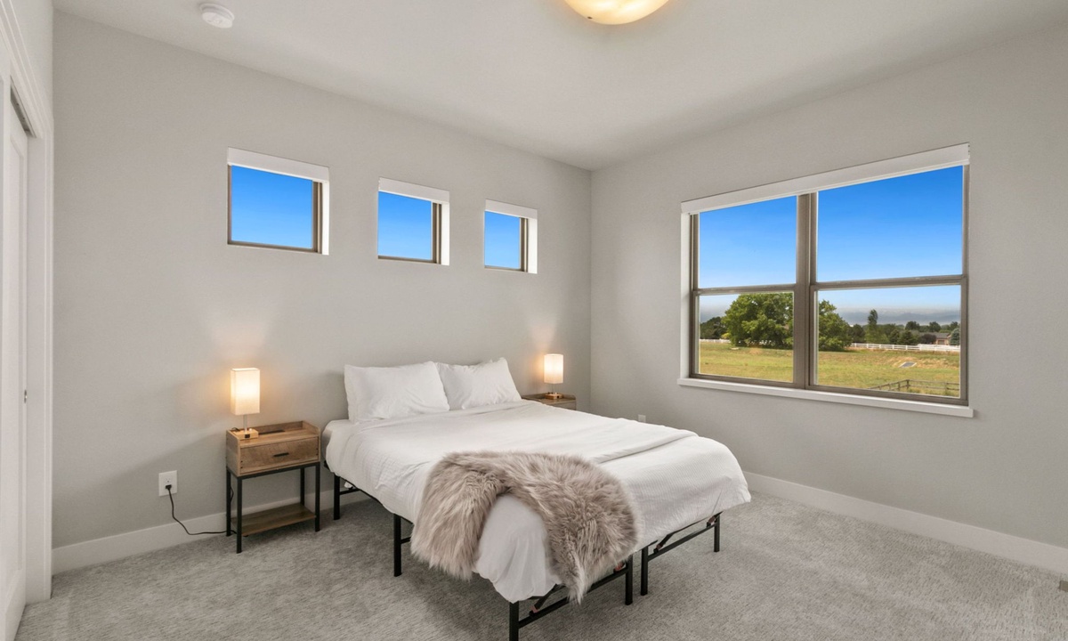 Bedroom 2 | Queen Bed with Smart TV and Rocky Mountain Views (main level)