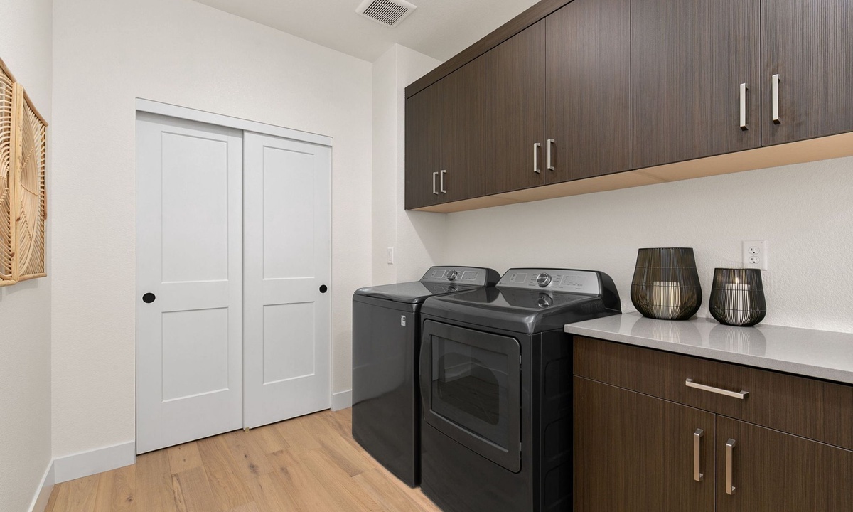 Laundry Facilities | There are games and chairs stored in this closet for the side yard!