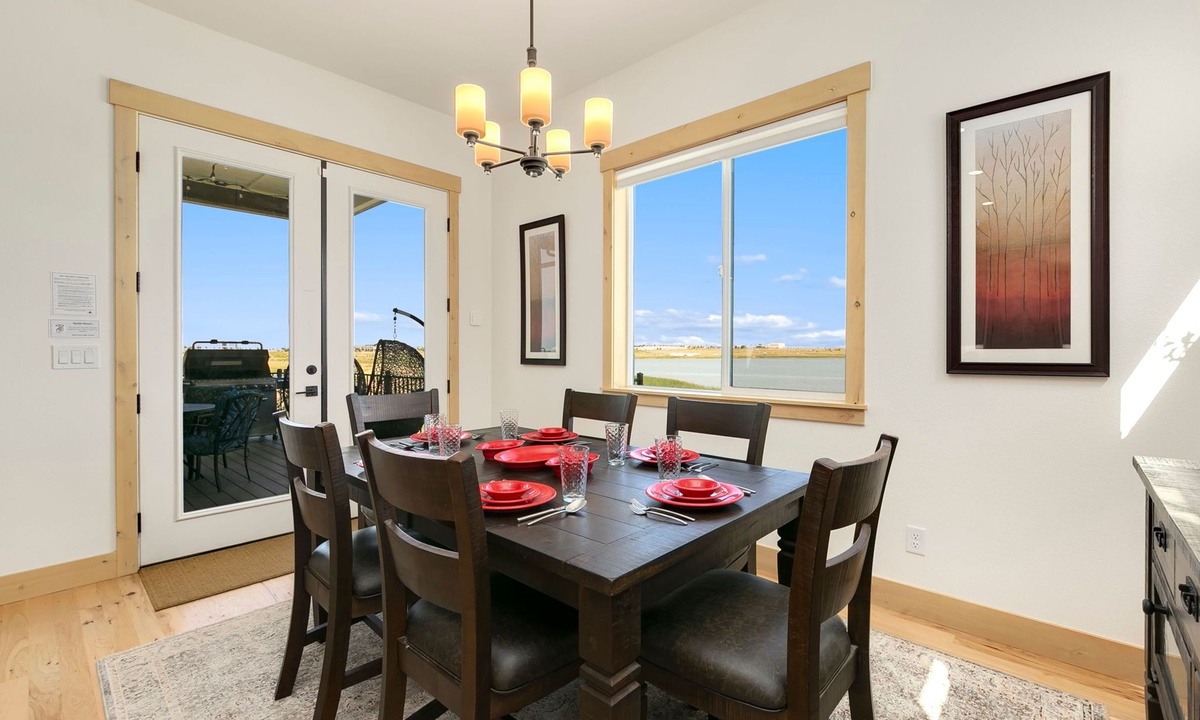 Dining Area | Sunny and bright with gorgeous lake views!