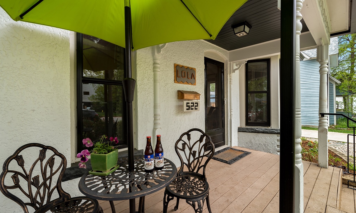 Front Porch with Outdoor Seating and Umbrella