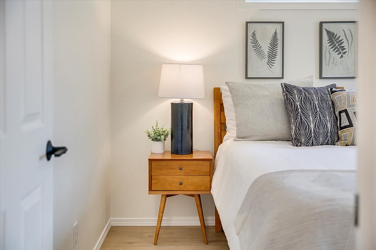 Drift into peaceful sleep in your beautifully designed bedroom, where modern comfort meets serene style and natural touches create the perfect retreat.