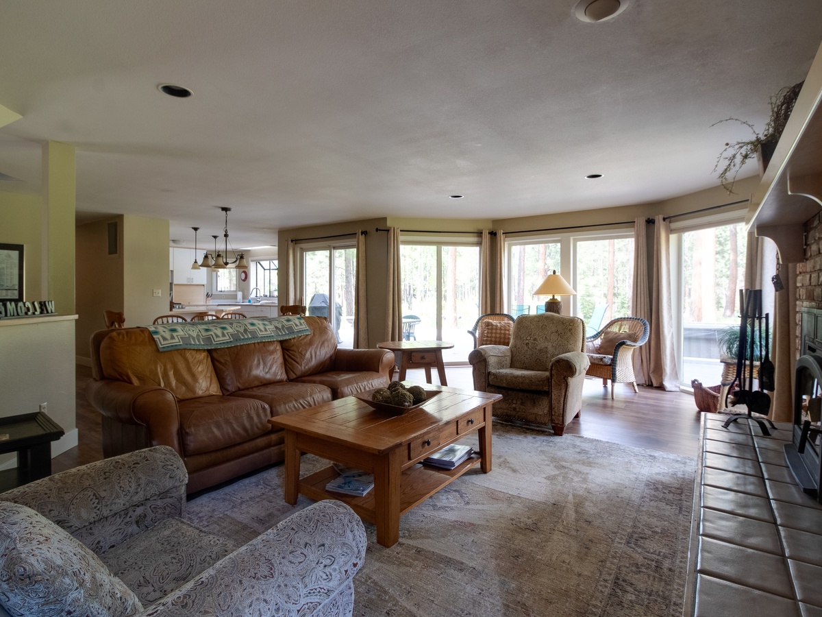 Living Room: Sun-soaked space with rustic charm