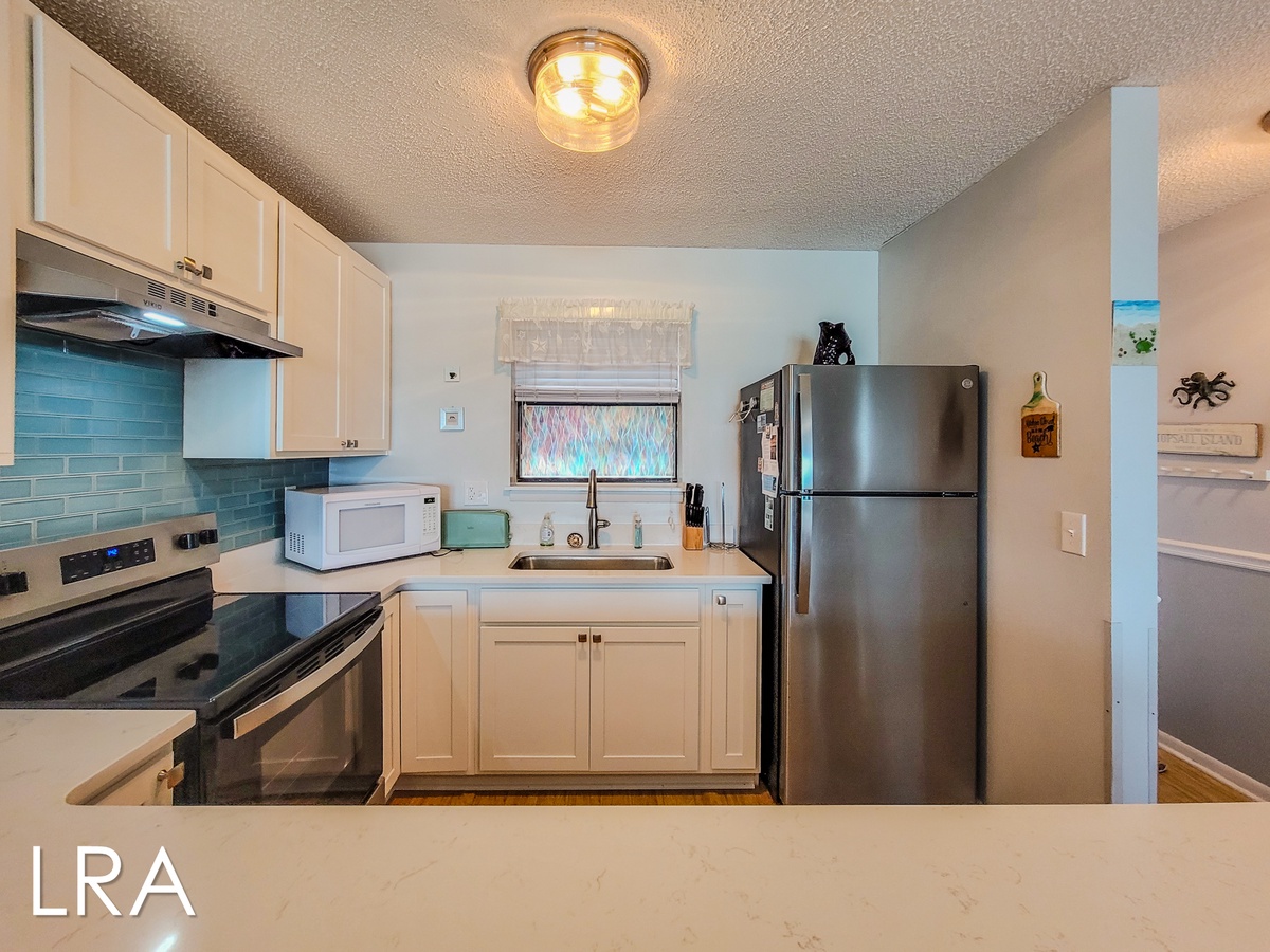 1866 New River Inlet Rd #3407 (Isle Of Palm Trees {Int Refresh - Kitchen]) - watermarked-8
