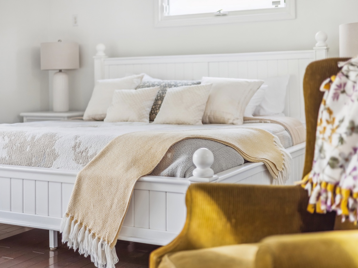 The primary suite on the second floor includes a king bed for ultimate comfort