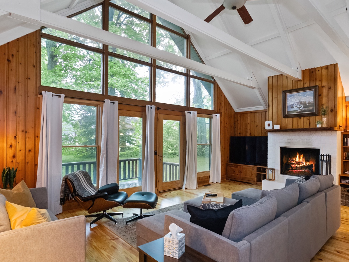 Charming A-frame design with large windows that fill the space with natural light and offer beautiful views.