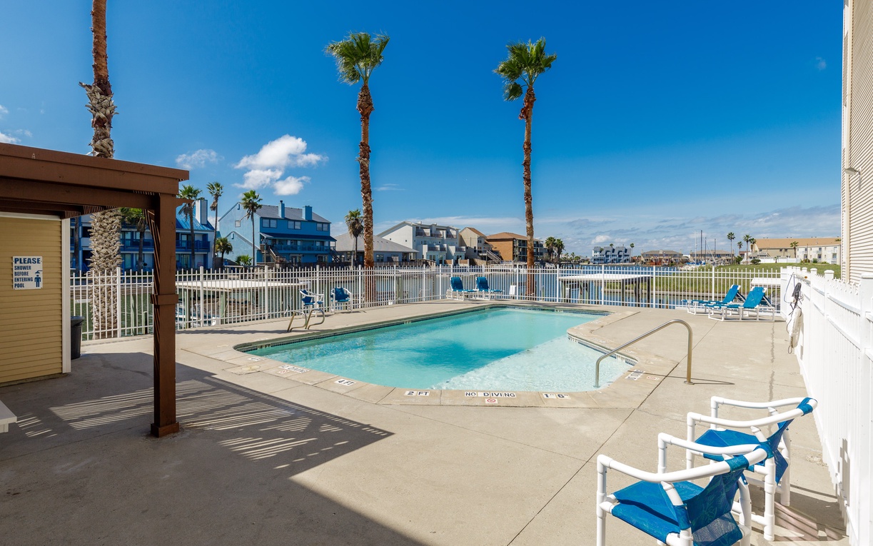 Dive into your private poolside paradise! Soak up California sunshine on comfortable loungers surrounded by swaying palms and coastal charm.