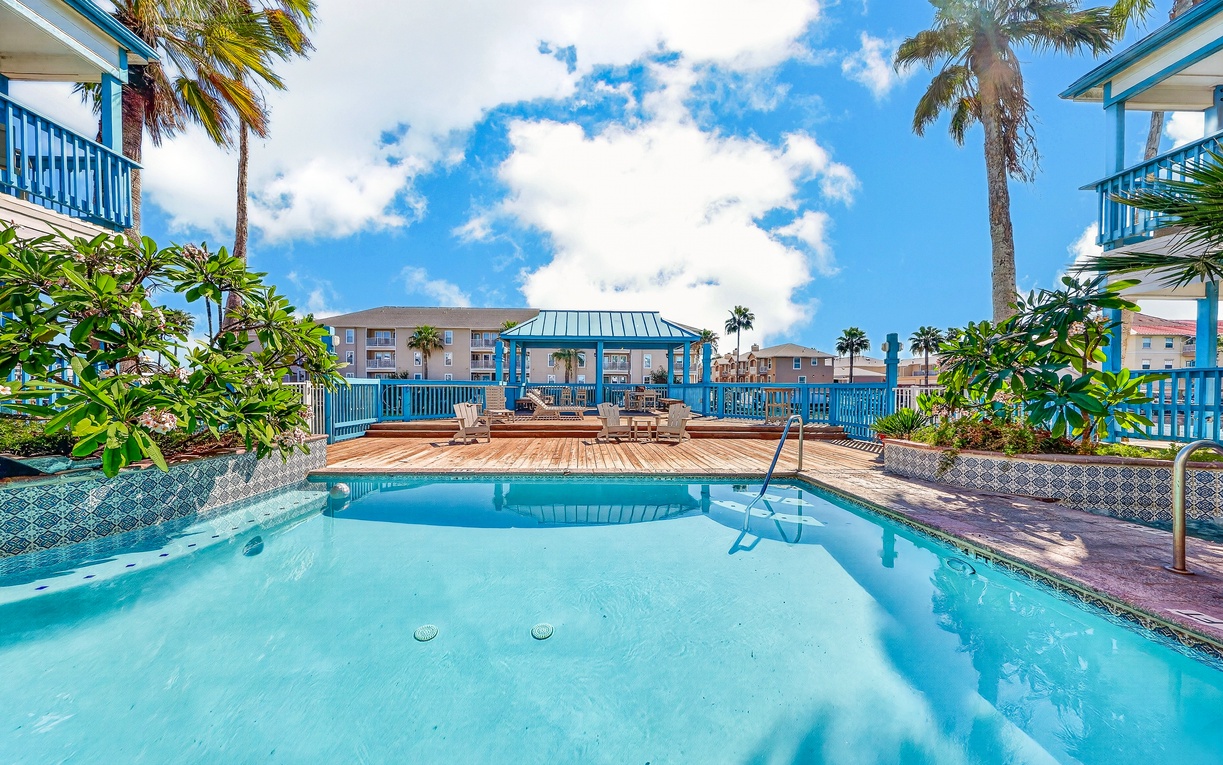 Soak away your cares in the bubbling hot tub, then relax poolside surrounded by swaying palms and sunshine. Your perfect tropical escape awaits.