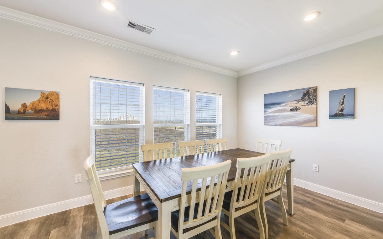 Gather around this spacious dining table where your group can share memorable meals together in comfort and style.