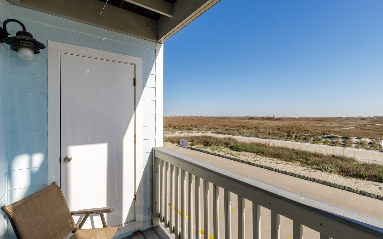 Step onto your private living area balcony to breathe in the fresh air and enjoy peaceful views of the natural landscape stretching endlessly before you.