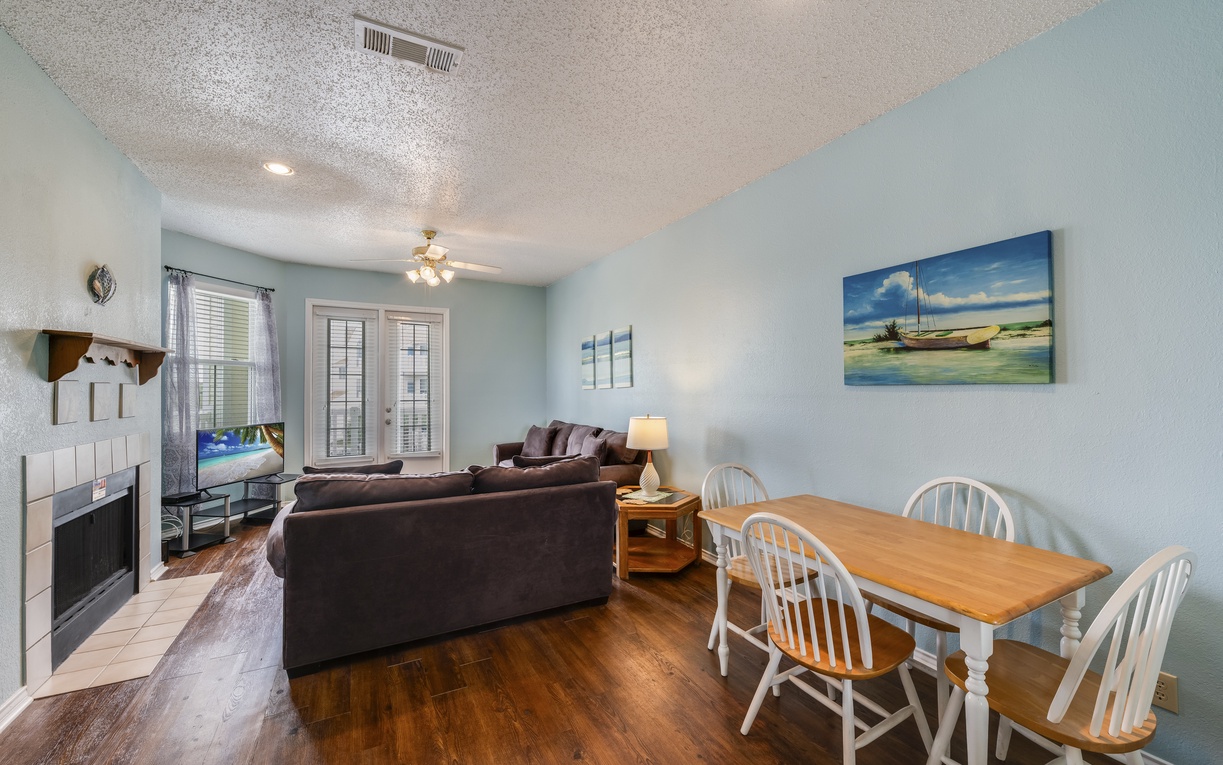 Open-concept kitchen with generous counter space, modern appliances, and a convenient breakfast bar overlooking the living area for easy entertaining.