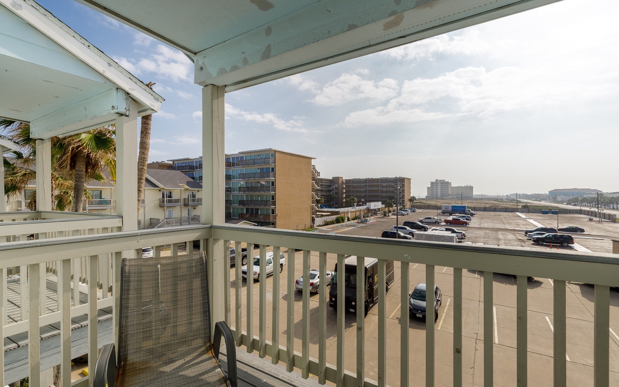 Step onto your covered balcony to enjoy ocean breezes and take in the surrounding coastal views.