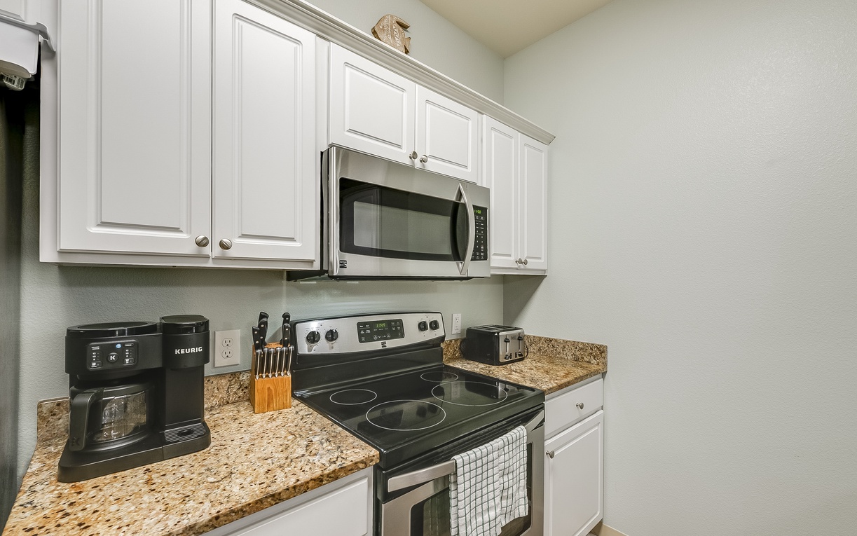 Your fully equipped kitchen features granite countertops, stainless steel appliances, and everything you need to prepare delicious meals during your stay.