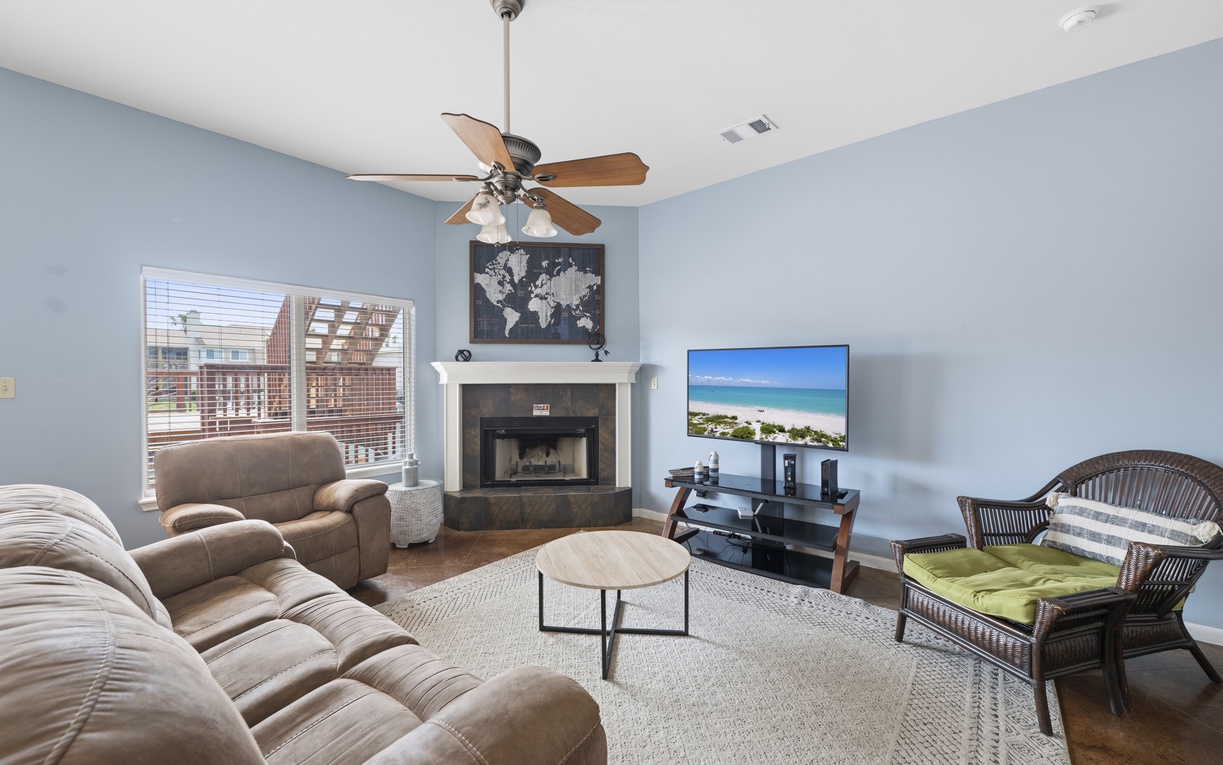 Your inviting living space features plush seating, and entertainment center. Unwind after exploring, sink into the cozy sofas, and enjoy movie nights in comfort.