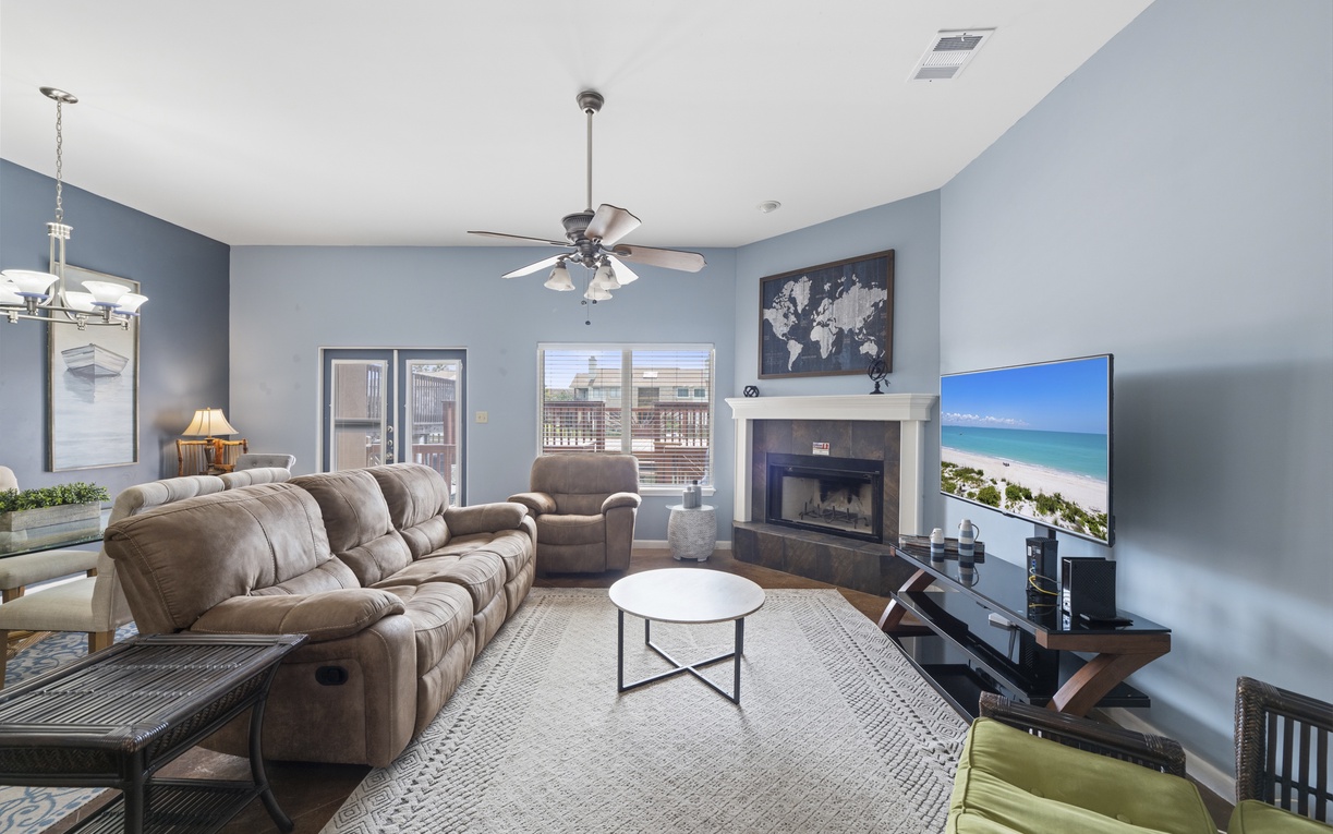 Sink into plush seating and unwind in your spacious living area, where natural light, and modern entertainment create the perfect retreat after your adventures.
