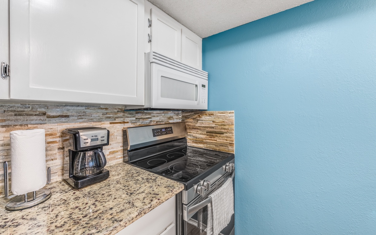 Wake up to fresh coffee from your private kitchen, complete with modern appliances and gorgeous granite counters.
