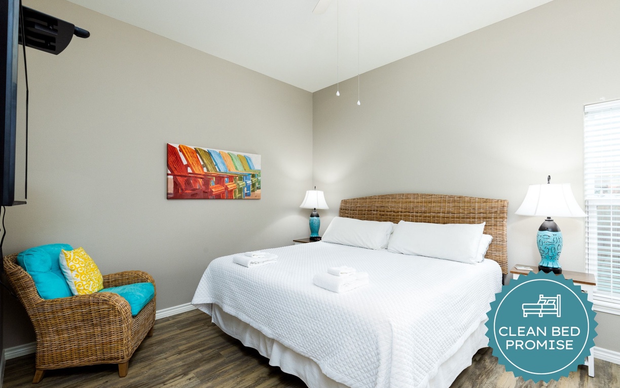 Sink into crisp white linens and coastal comfort in your peaceful bedroom retreat with beach-inspired decor.