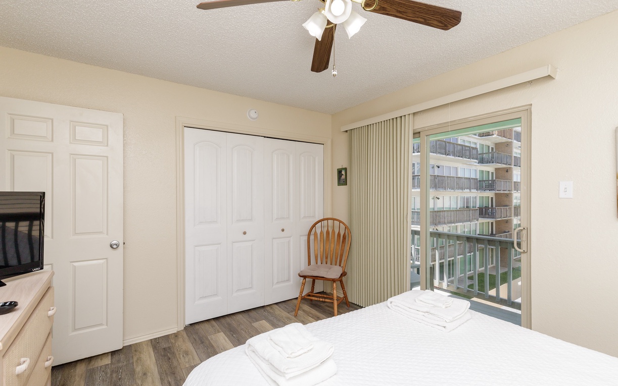 Relax in your guest bedroom with queen size bed and private balcony