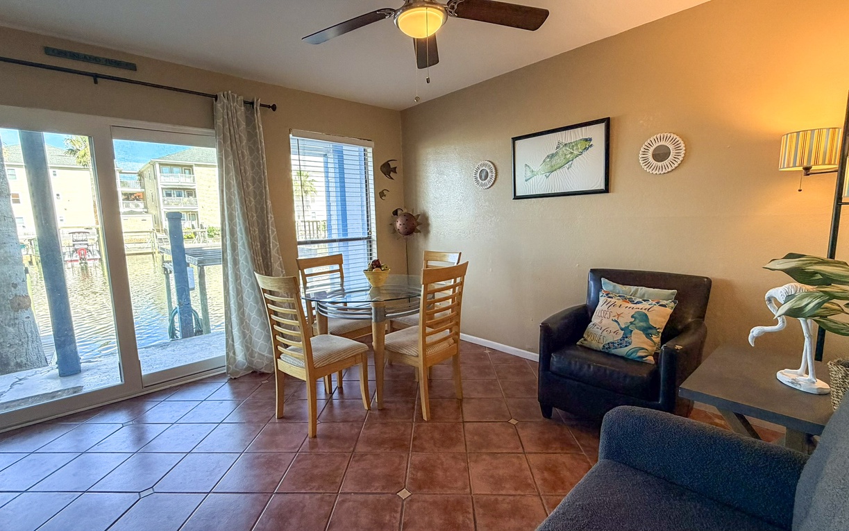 Gather around your dining table for memorable meals while the ceiling fan keeps you cool and comfortable.