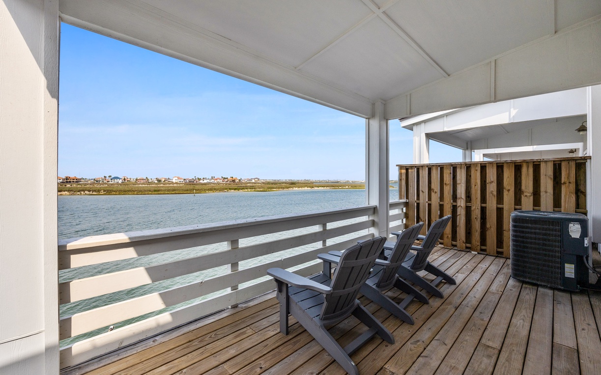 Relax in your waterfront chairs while enjoying peaceful water views from your private covered deck.