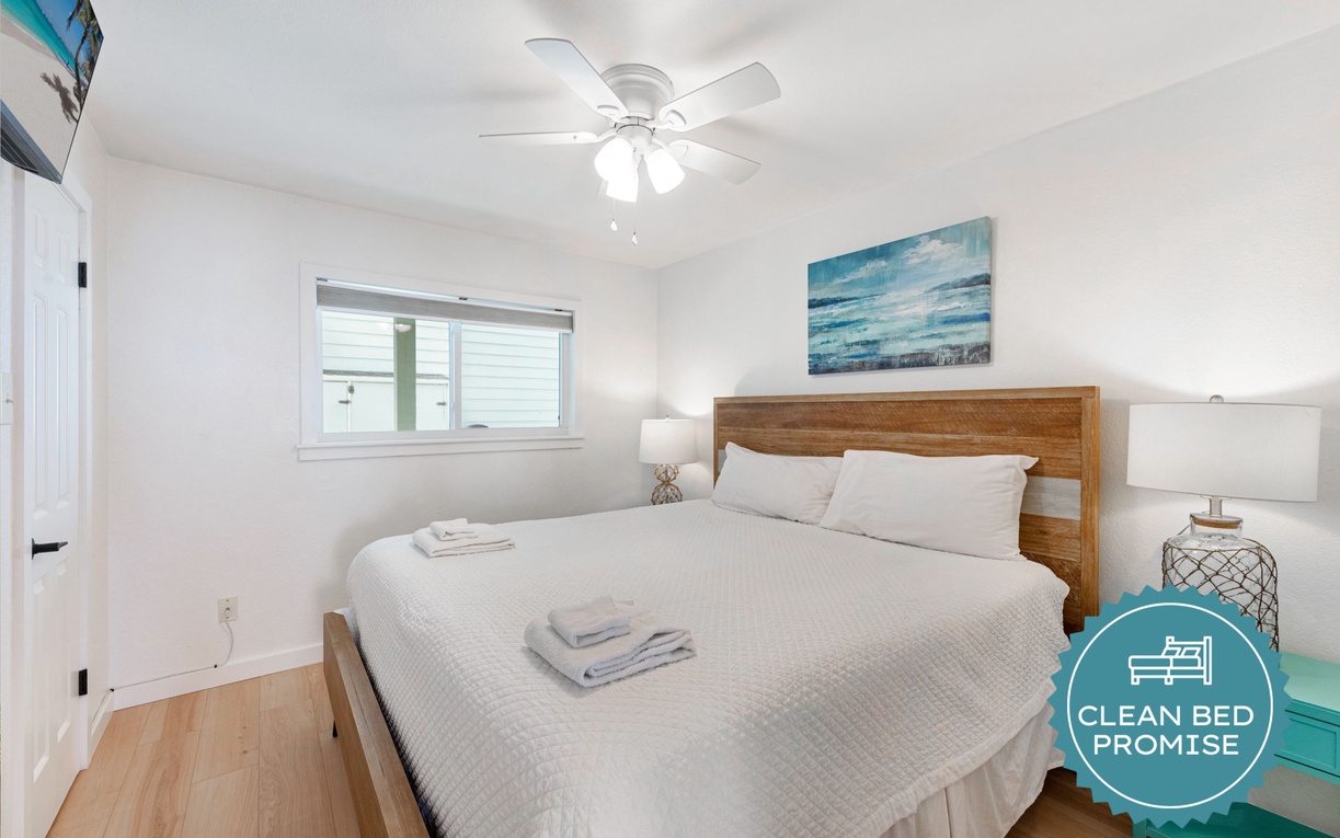 Drift off in your serene bedroom, where crisp linens and ocean-inspired art create a tranquil coastal retreat.