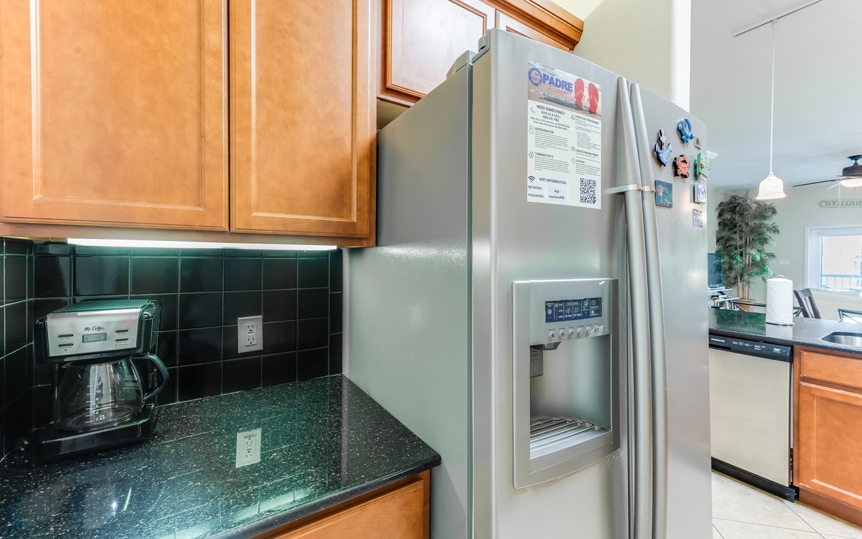 Your spacious kitchen features granite counters, stainless appliances, and everything needed to create memorable meals during your stay.