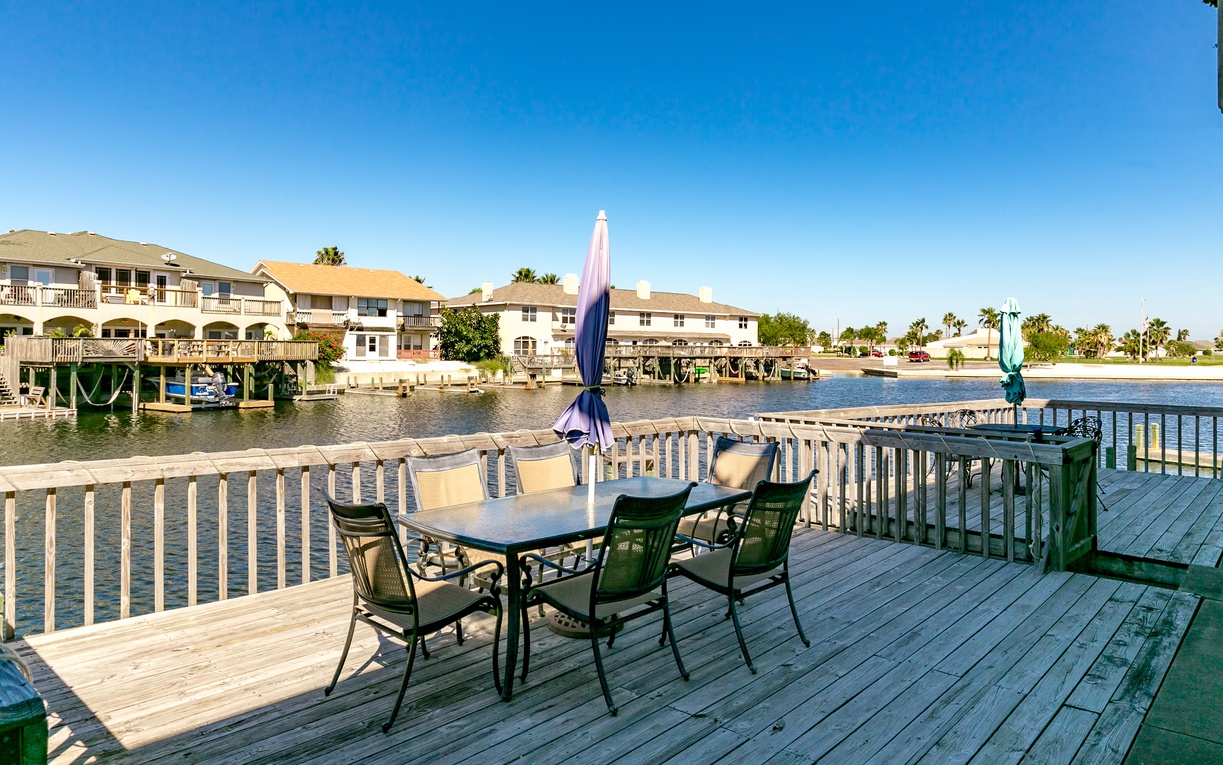 Enjoy waterfront dining on your private deck, where peaceful canal views and coastal charm create the perfect setting for memorable meals.