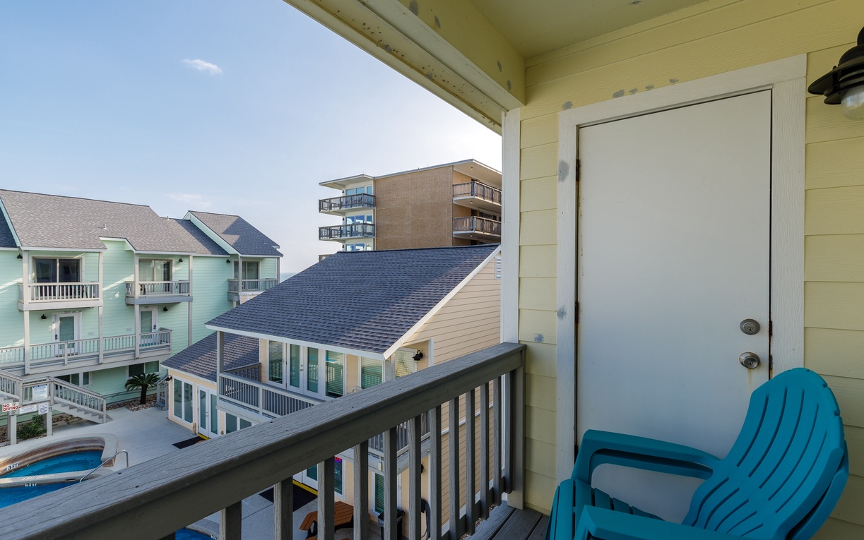 Your primary bedroom balcony with a great view of the pool